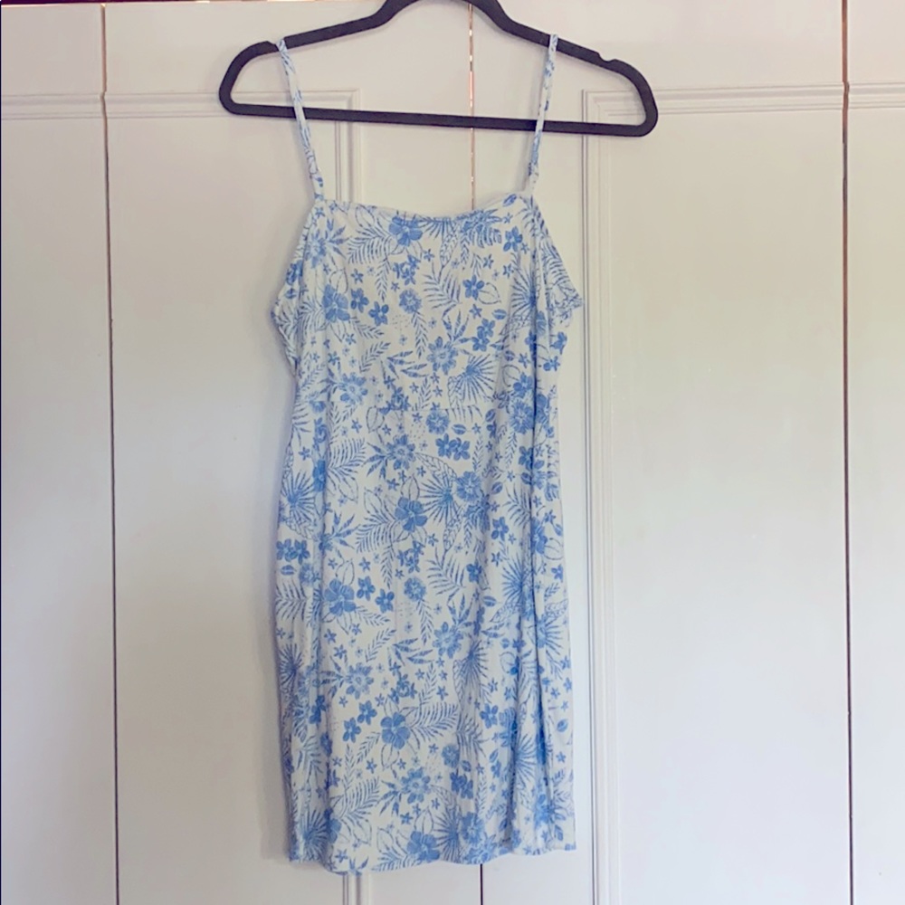 Beautiful form fitted, floral strap dress !